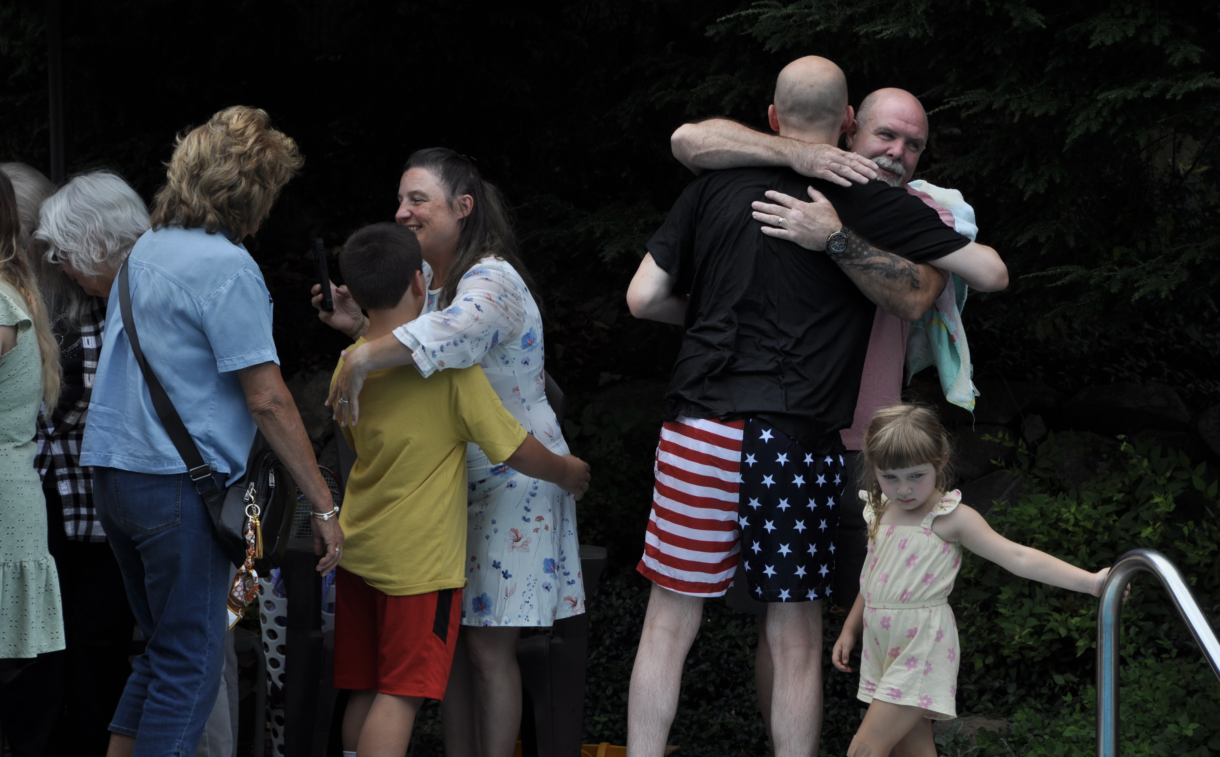 The church celebrating a believer's baptism